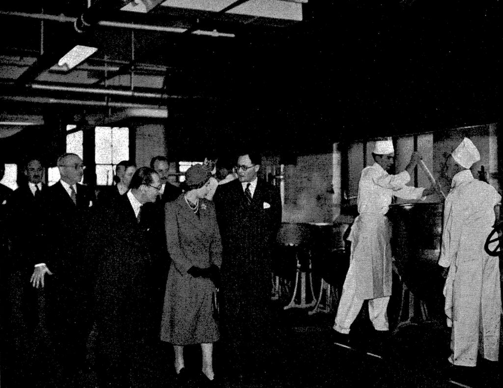 Princess Elizabeth watches Ted Swallow and Wally Banks making soup in the Frood Kitchens at Cadby Hall