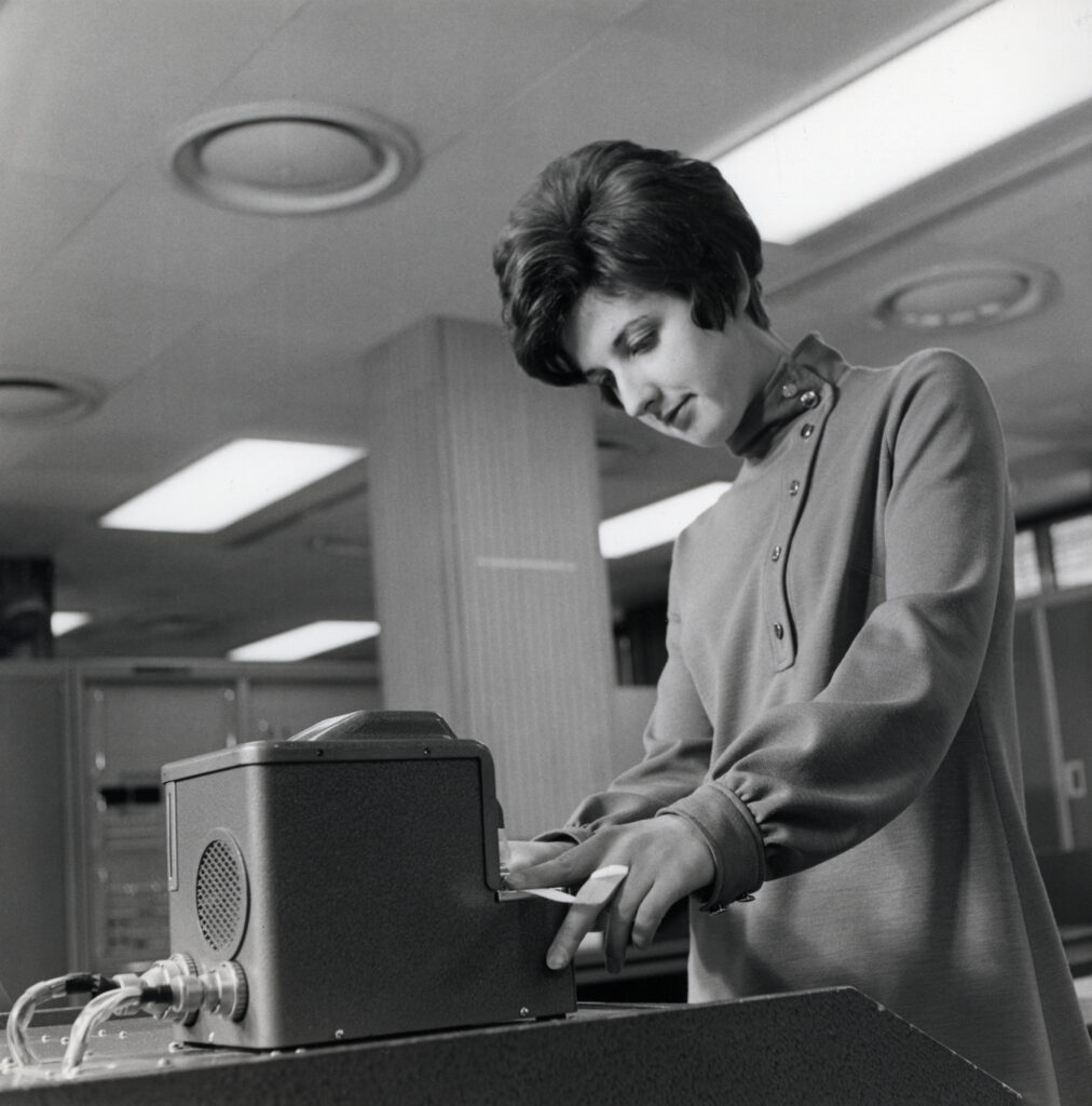 A LEO woman operating LEO III equipment circa 1960